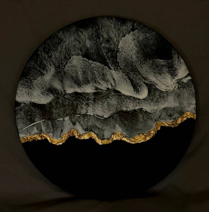 monchrome sea black gold cliffs